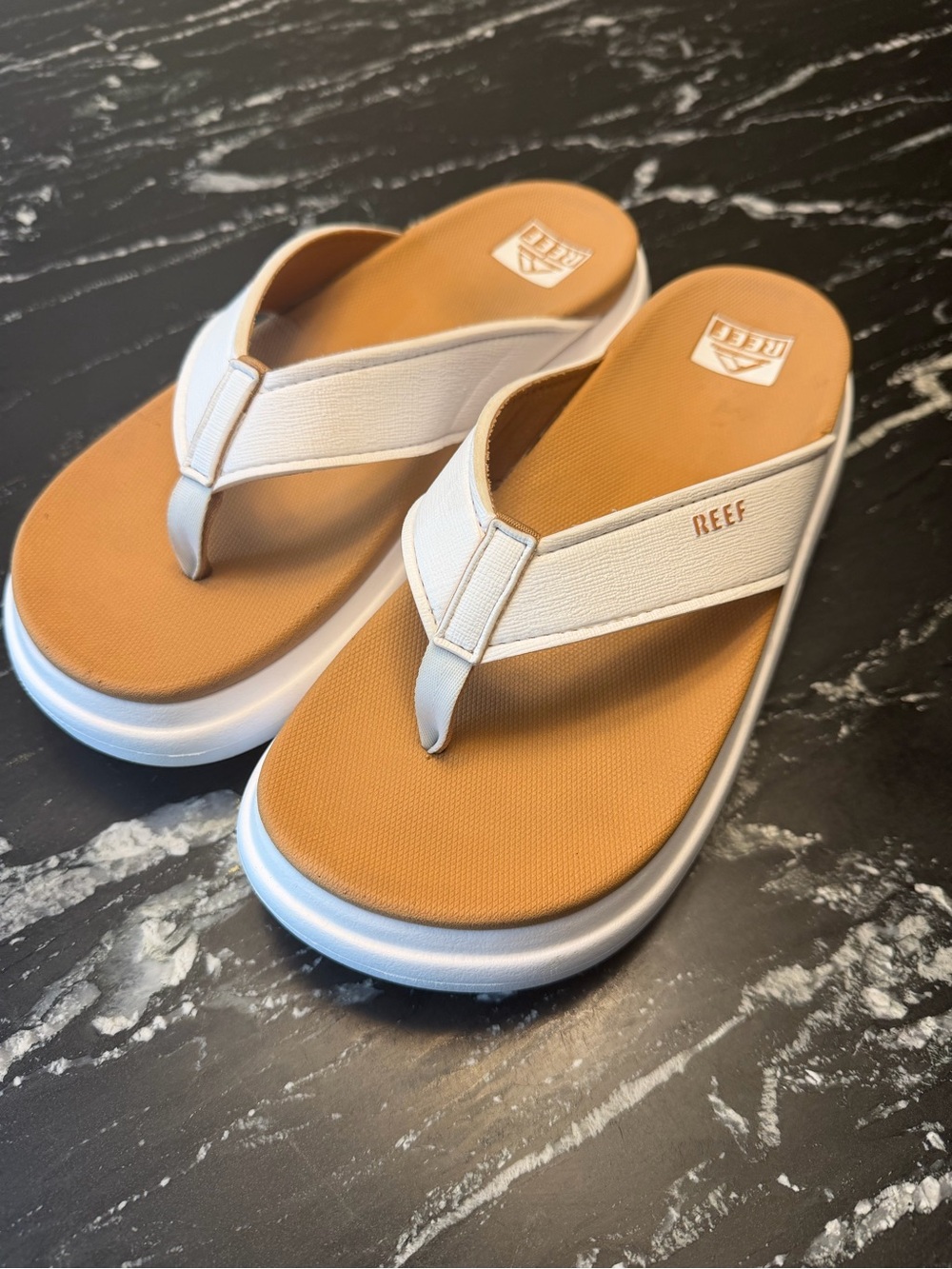 Reef Woman’s white and Tan Foam Flip Flops